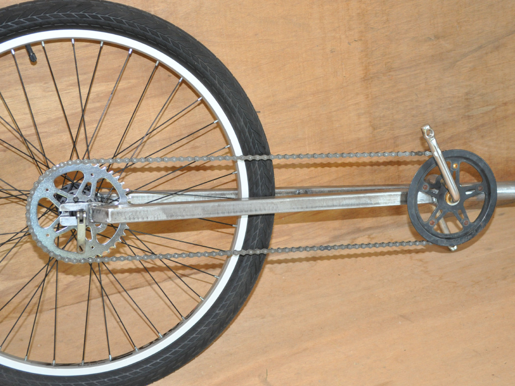 Unicycles Short and Tall - chain drive
